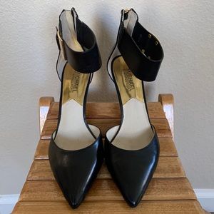 Michael Kors black leather heels with gold accents